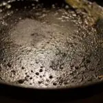 Cleaning burnt grease from frying pans