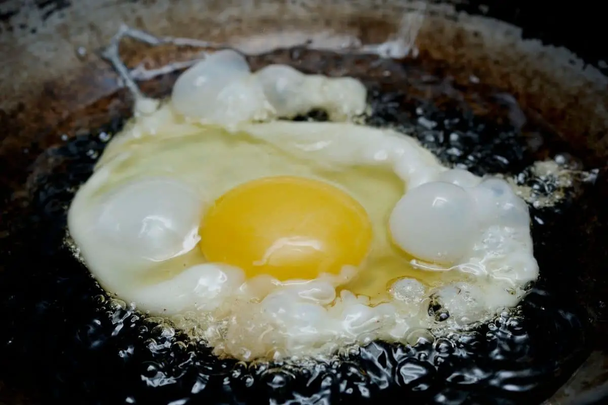 Why do eggs explode when frying?
