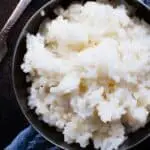 Do I need to boil rice before frying?